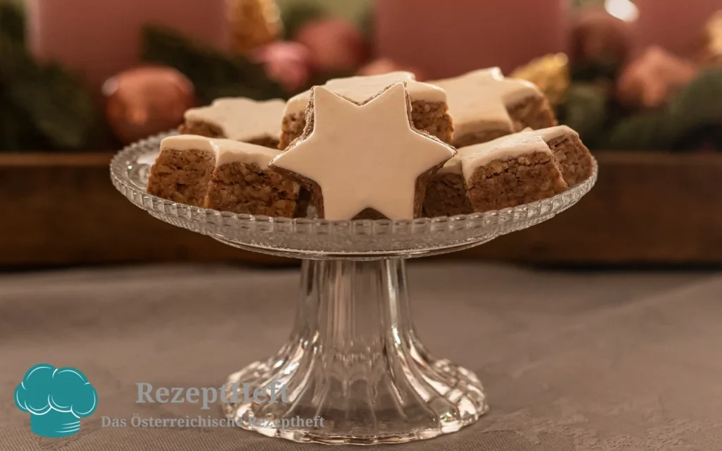 Zimtsterne mit Kirschwasser, Marzipan und weißer Glasur