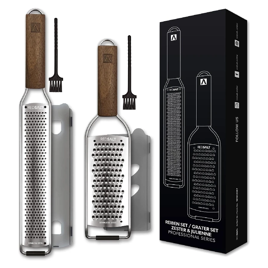 Stainless-steel grater with a wooden handle and protective sheath, shown with a small cleaning brush and a matching stand/holder.